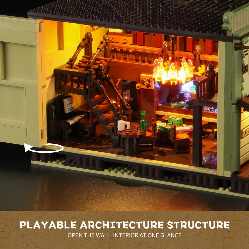 Funwhole F9021 Western Saloon interior with open wall, illuminated chandelier, bar, staircase, and detailed play features