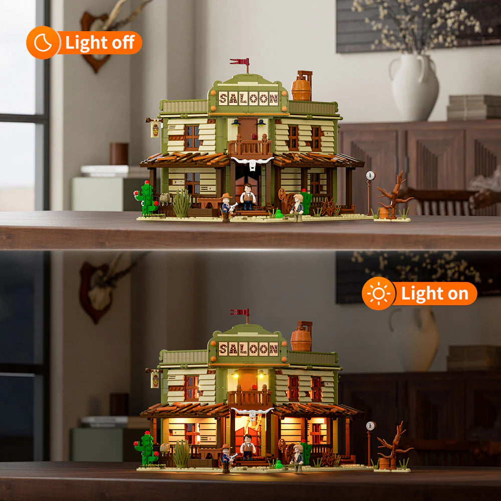 Funwhole F9021 Western Saloon modular building shown with LED lights off and on, highlighting illuminated windows and porch