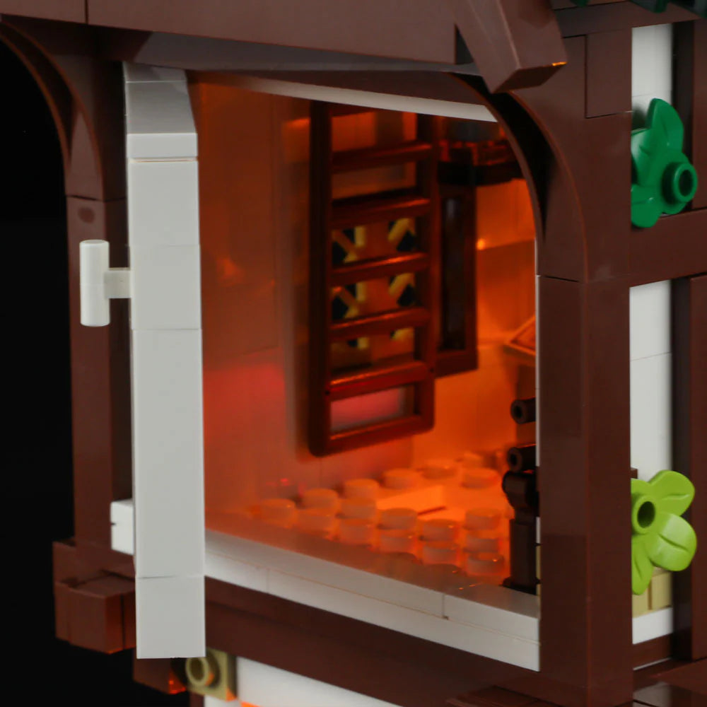 Funwhole Medieval Apothecary Shop Set – Open window view with warm glowing interior, showcasing medieval architecture details