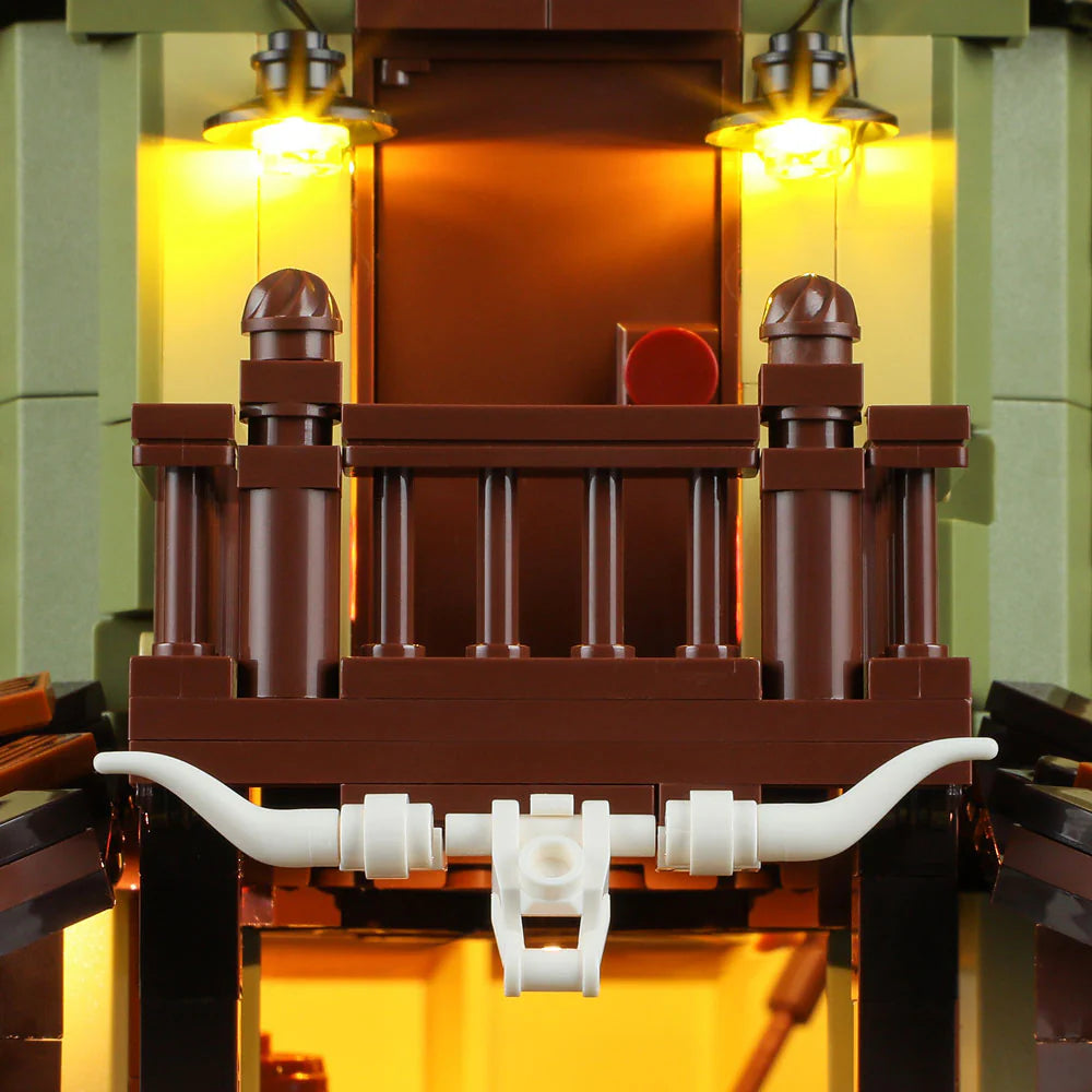 Lumibricks F9021 Western Saloon balcony with glowing lanterns, bull skull decoration, and classic Western wooden railing