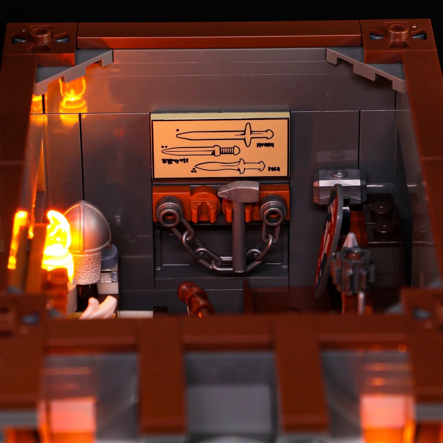 Lumibricks F9040 Forge House armory with sword design wall panel, helmet, shield, and glowing forge lights