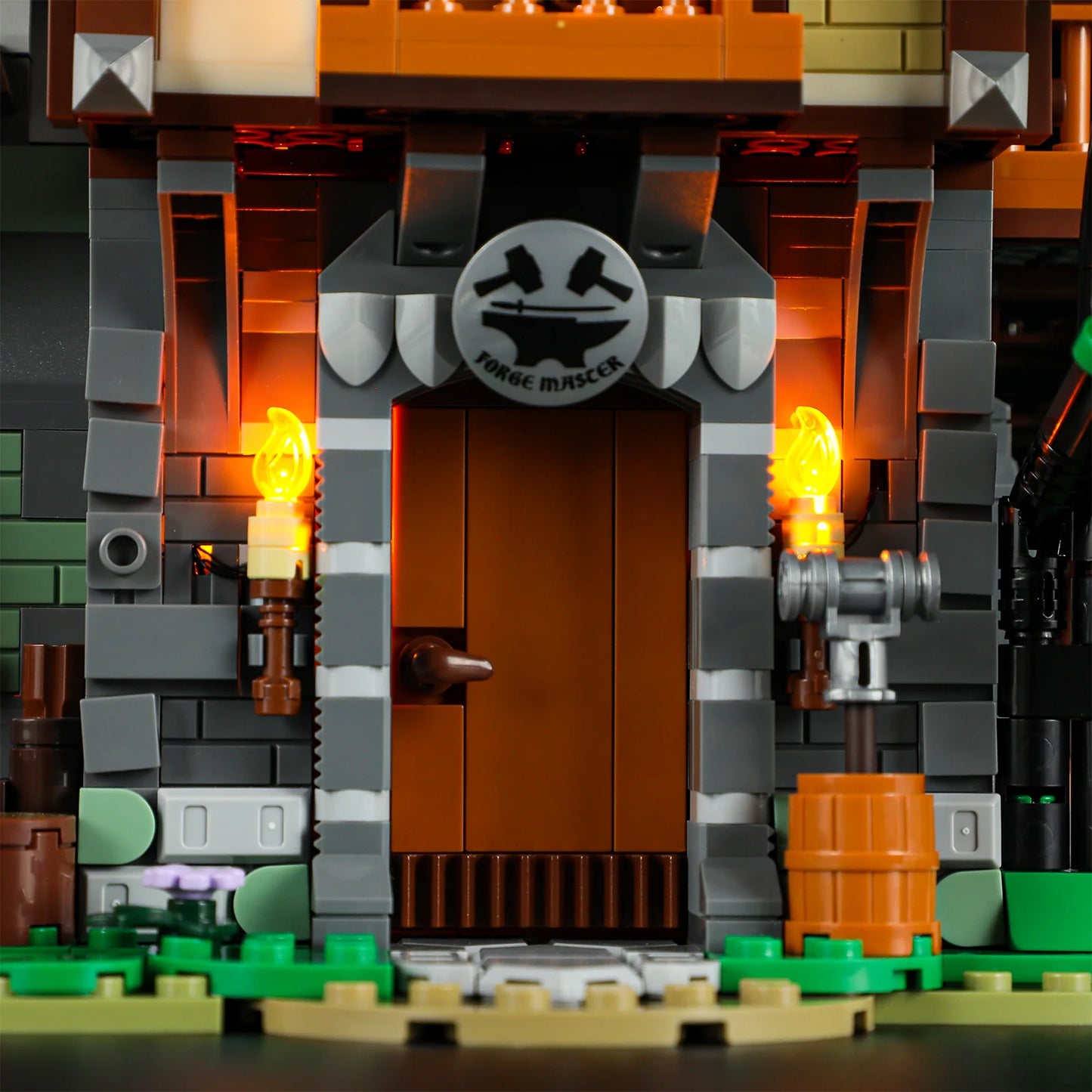 Lumibricks F9040 Forge House entrance with “Forge Master” sign, brown door, and illuminated wall torches