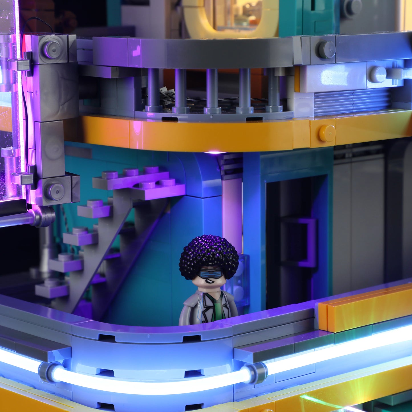 Lumibricks (Formerly Funwhole) F9042 Cyberpunk Apartment lower balcony with minifigure, staircase, and blue neon lighting