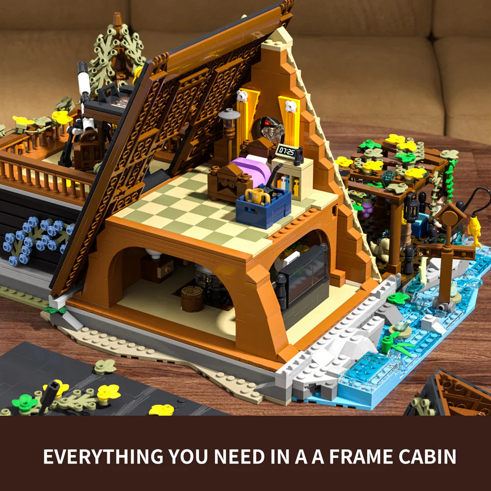 Funwhole A-Frame Cabin set with detailed interior, featuring bedroom, kitchen, and outdoor scenery for immersive play