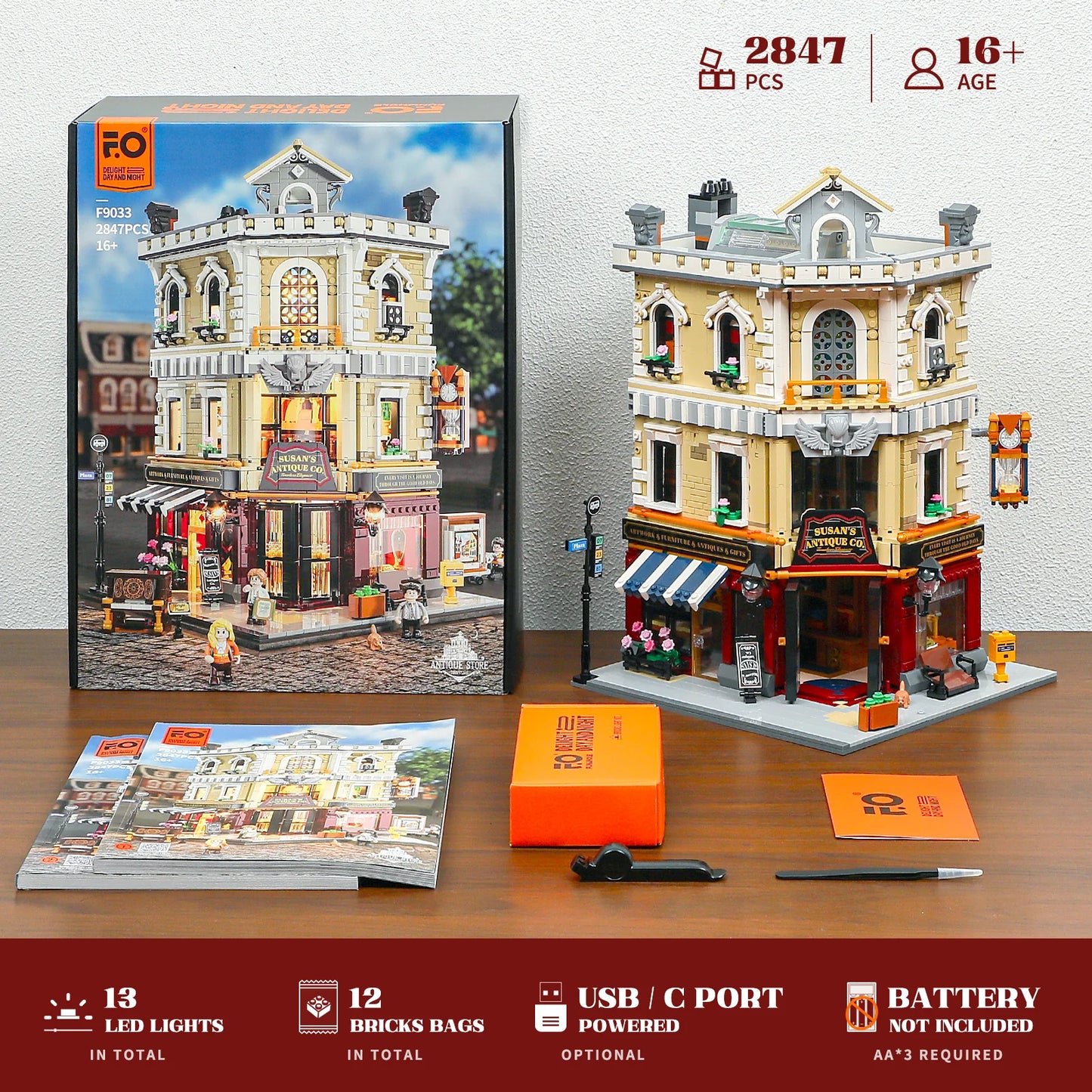 Funwhole Antique Store building set unboxed, showing the assembled model, packaging, instruction manual, and accessories.