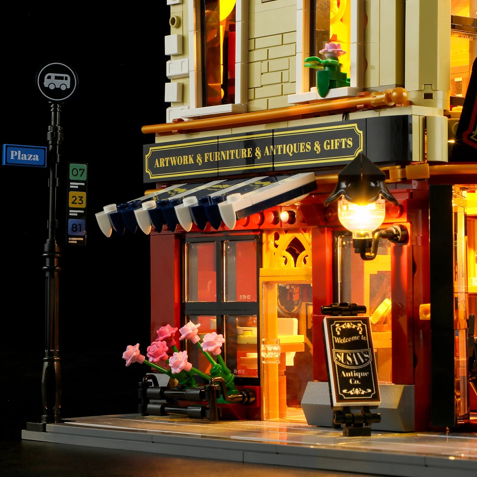 Funwhole Antique Store front view with LED lights, vintage signage, awning, and decorative flowers for a cozy night ambiance.