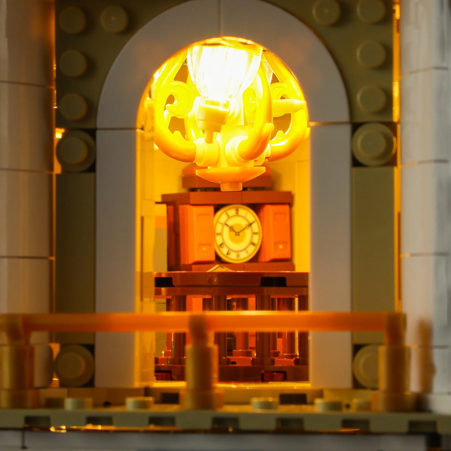 Funwhole Antique Store featuring a classic grandfather clock and ornate chandelier, illuminated with warm lighting in an arched window.