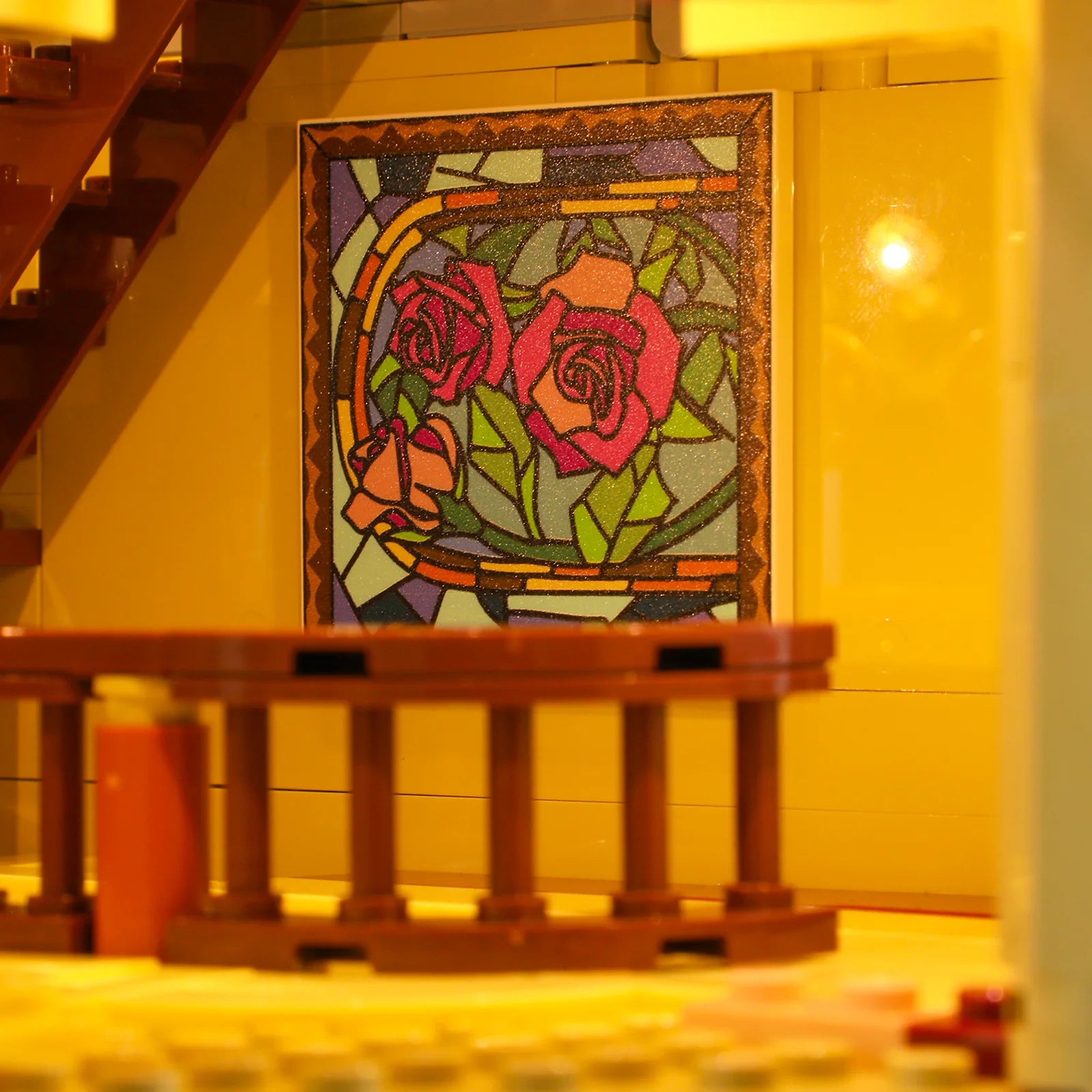 Close-up of Funwhole Antique Store's intricate rose-themed stained glass painting with warm interior lighting.