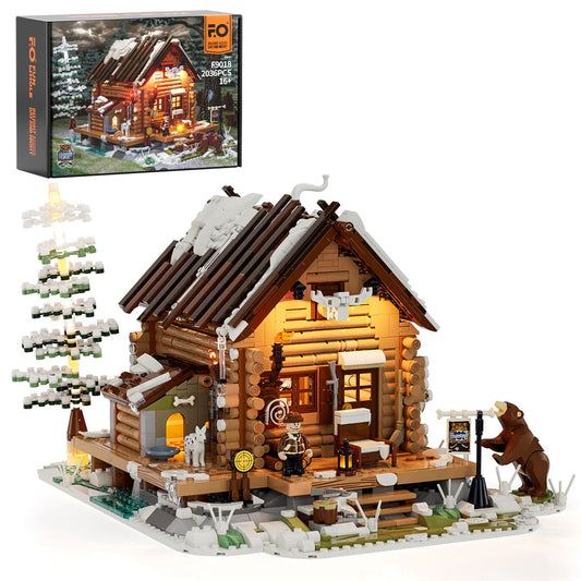 Funwhole Hunting Cabin set featuring a log cabin with LED lights, snowy details, a bear figure, and a winter forest scene