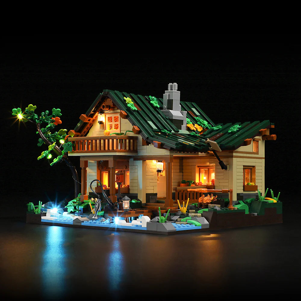 Funwhole Lakeside Lodge set with LED lights, showcasing a cozy illuminated cabin by the water with detailed outdoor scenery