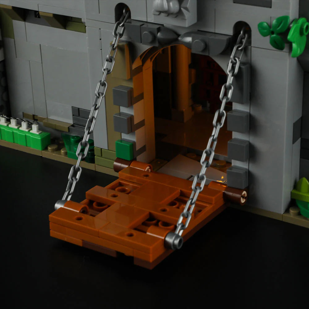 Funwhole Medieval Watchtower Set F9027 – Close-up of functional drawbridge with chains, part of the LED-lit castle gate design