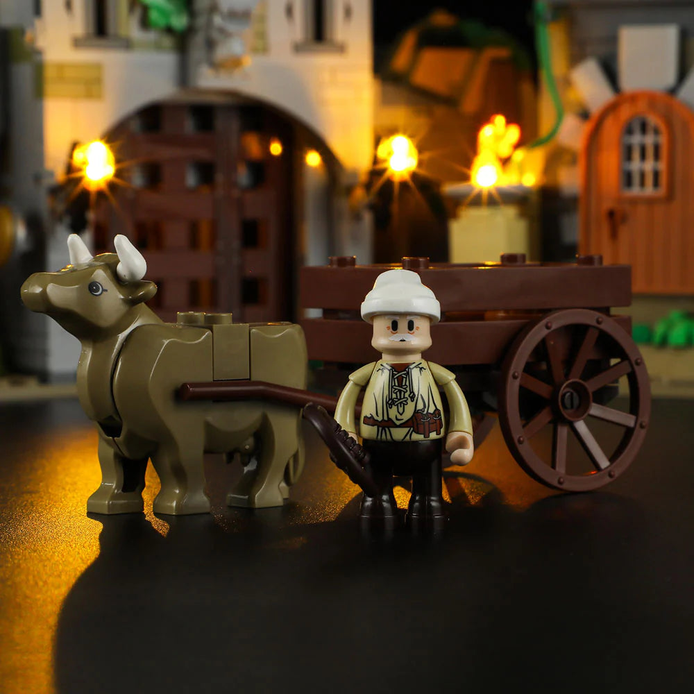 Funwhole Medieval Watchtower Set F9027 – Ox-drawn cart with medieval minifigure in front of illuminated castle gate