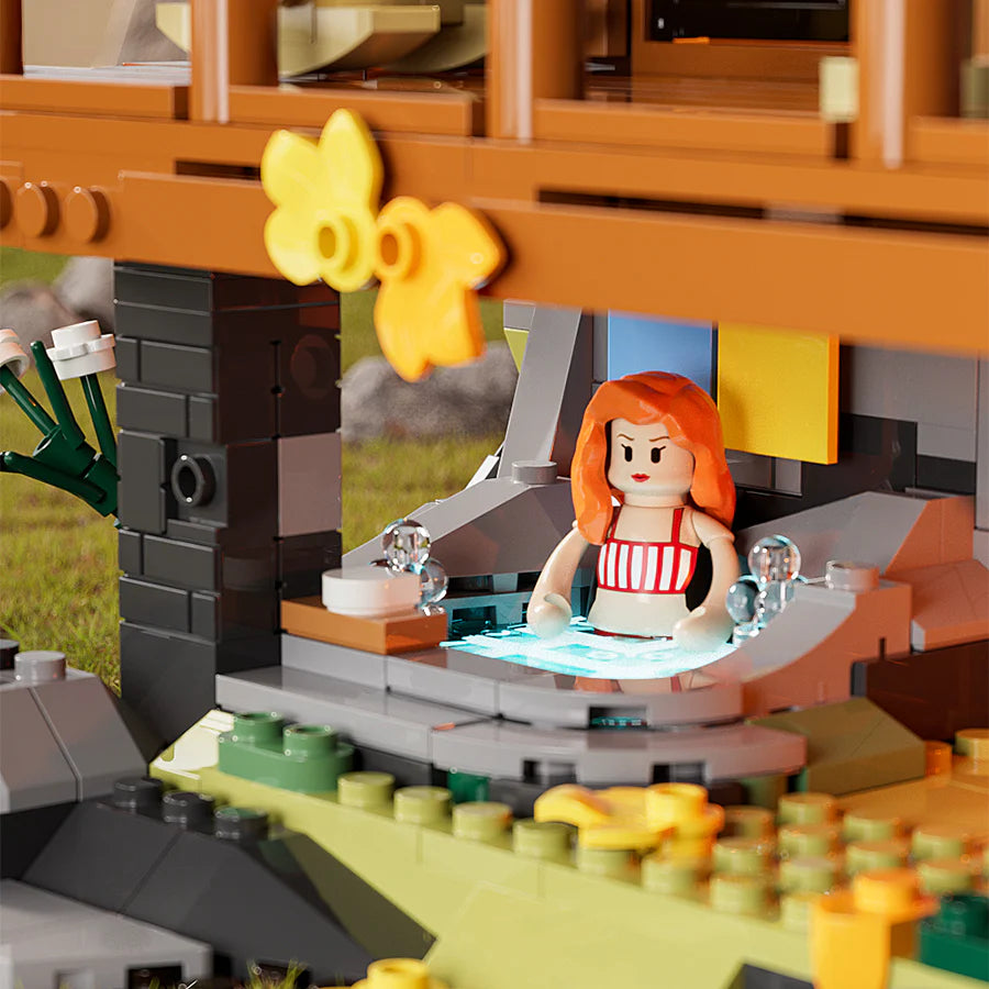 Funwhole Mountain Cabin – LEGO minifigure enjoying a relaxing hot spring under the cozy wooden cabin with nature details