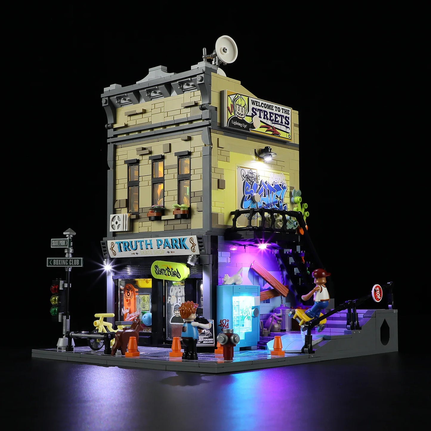 Funwhole Skate Shop set at night with LED lights, graffiti, and mini-figures in an urban street scene. Perfect for collectors