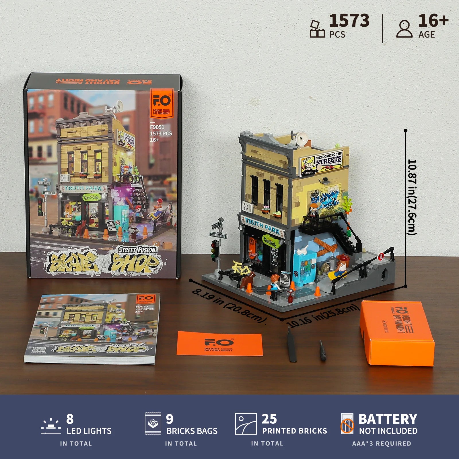 Funwhole Skate Shop set unboxing with box, manual, LED lights, printed bricks, and dimensions displayed for assembly details