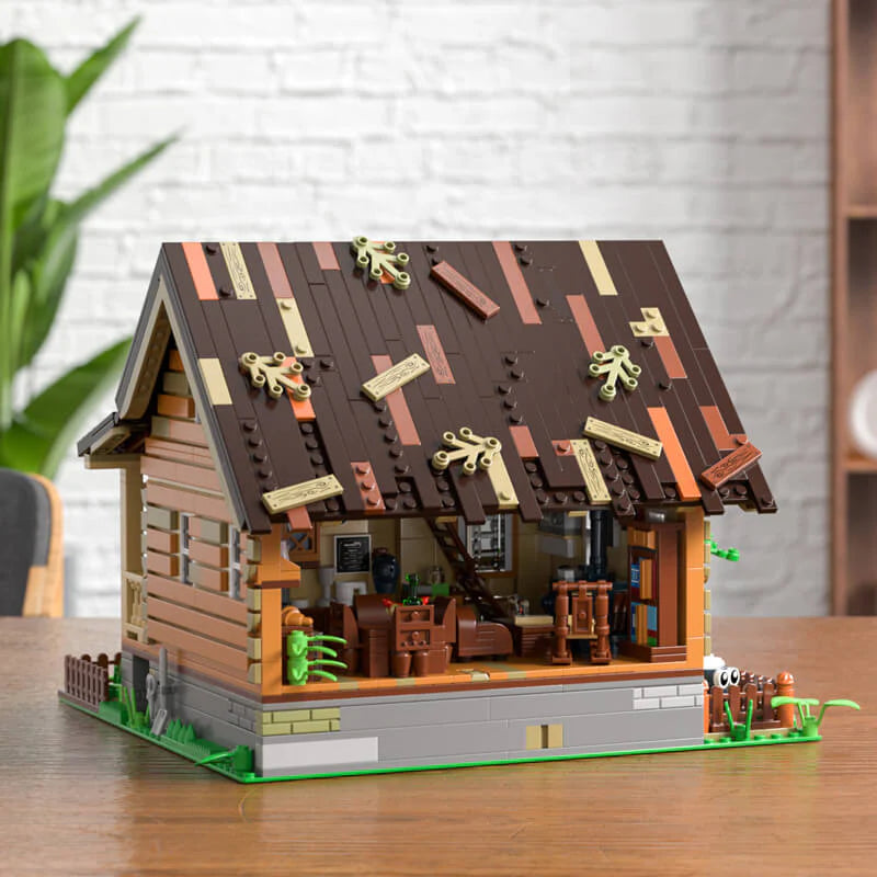 Funwhole Wood Cabin rear view showcasing detailed interior with rustic furniture, bookshelves, and cozy log cabin decor