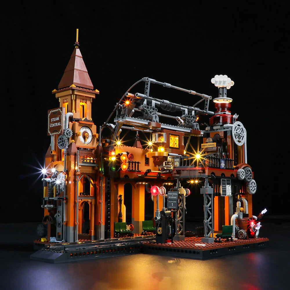 Lumibricks F9007 Steampunk Train Station angled view with brass gears, pipes, and bright LED lighting effects
