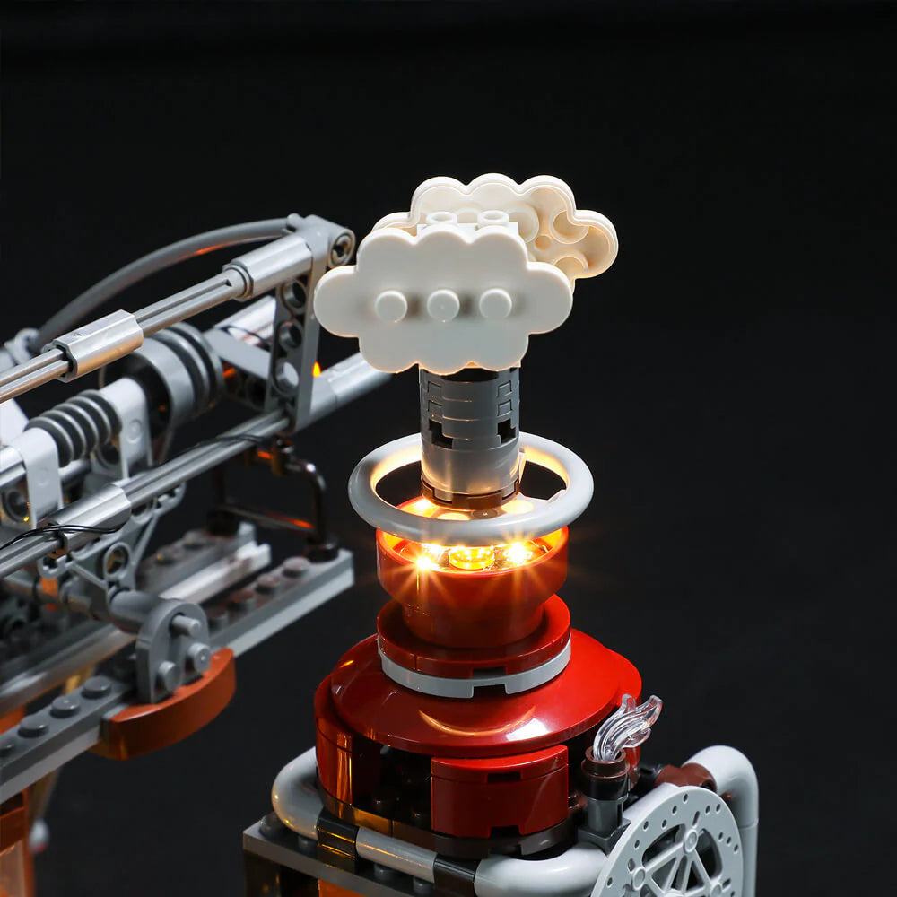 Lumibricks F9007 Steampunk Train Station chimney with white steam cloud and glowing orange LED lights