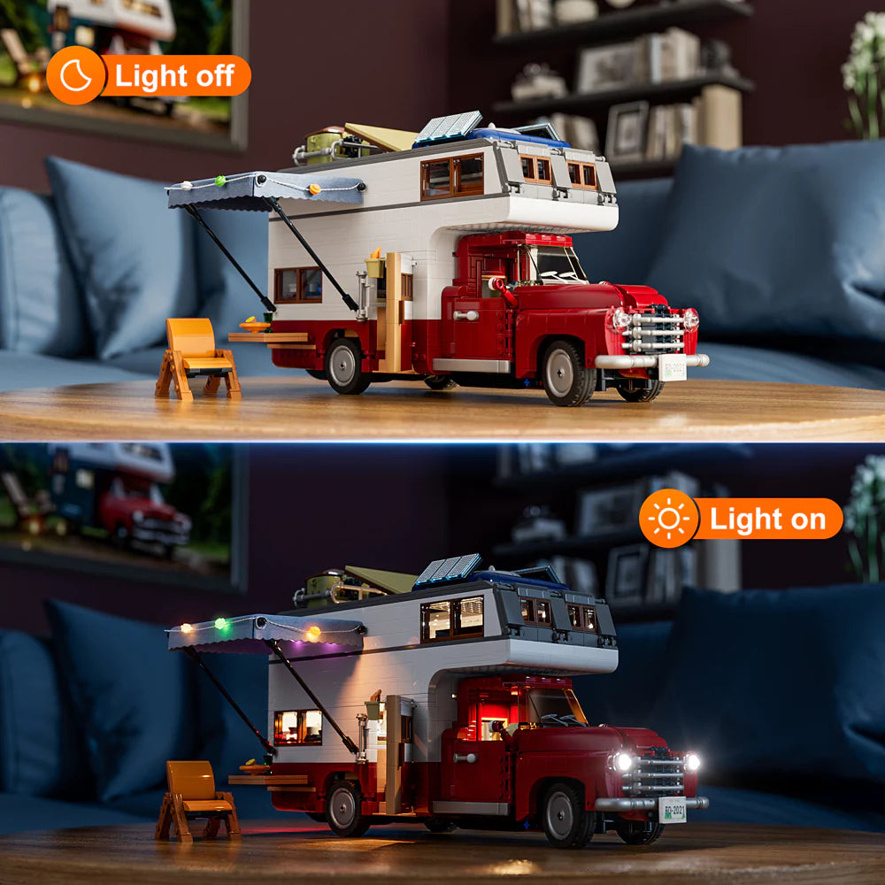 Lumibricks F9012 Camper Van with awning, orange chair, and table showing lights off and on in living room setting