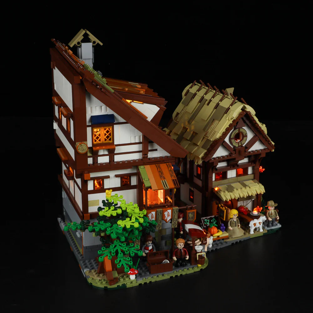 Lumibricks (Formerly Funwhole) F9015 Medieval Market angled night view with illuminated windows, market stands, and villagers