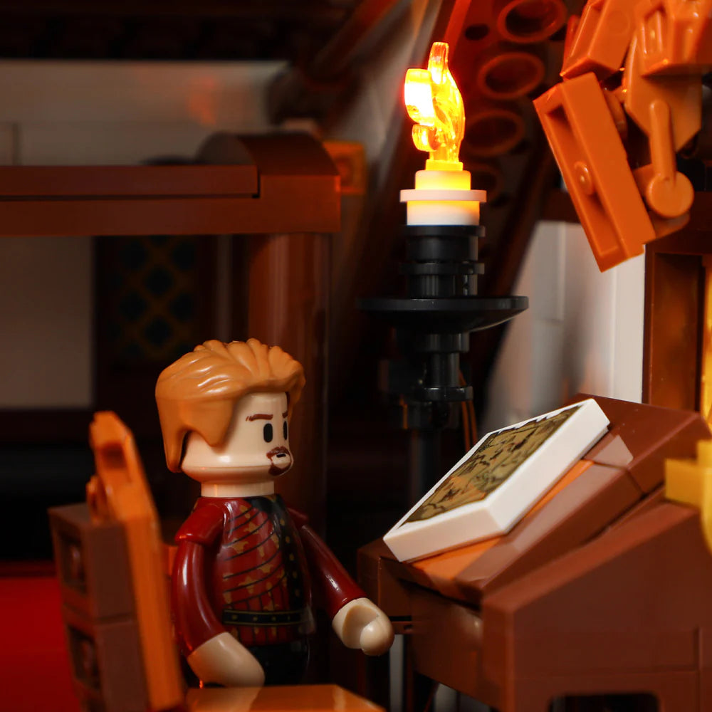 Lumibricks (Formerly Funwhole) F9015 Medieval Market minifigure at desk with map and illuminated wall torch