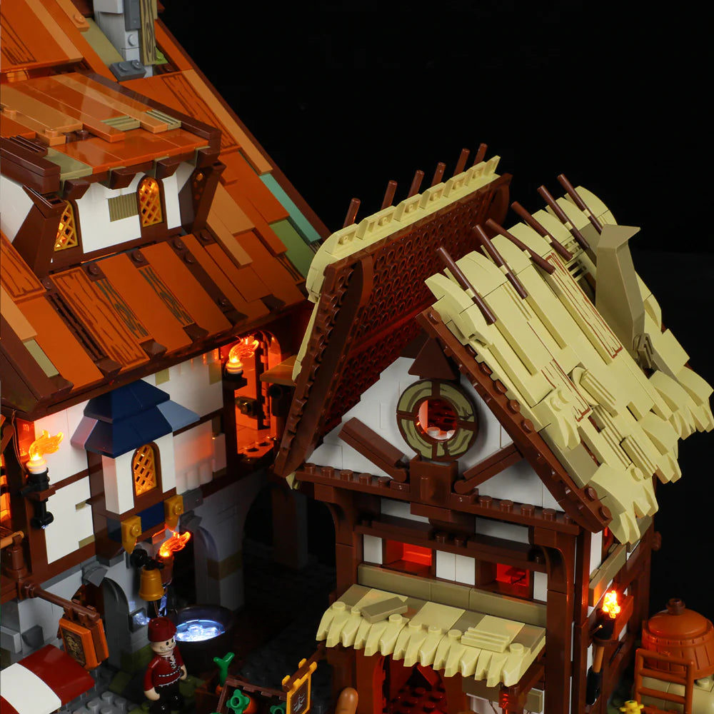 Lumibricks (Formerly Funwhole) F9015 Medieval Market illuminated exterior with detailed tiled roofs and glowing windows