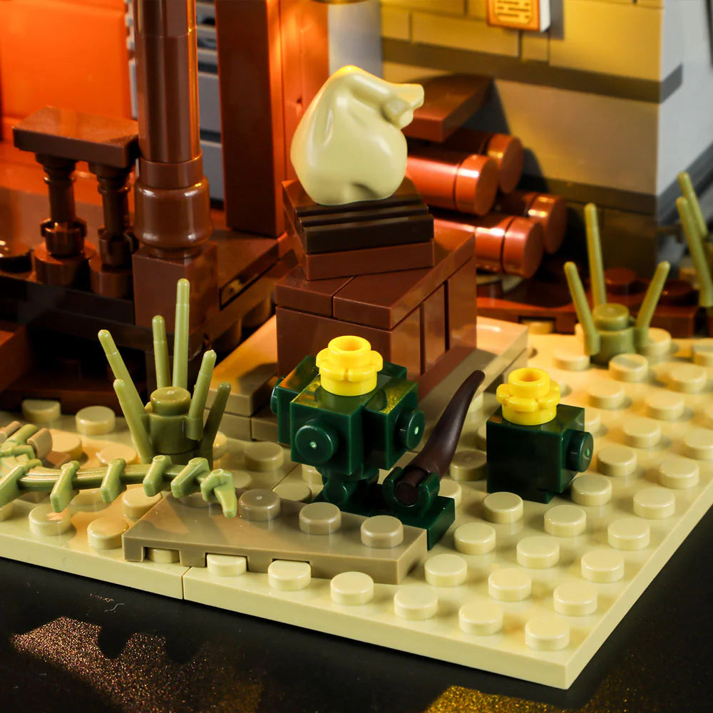 Lumibricks F9026 Sheriff’s Office exterior with desert plants, green cacti, yellow flowers, and money bag on brown crate