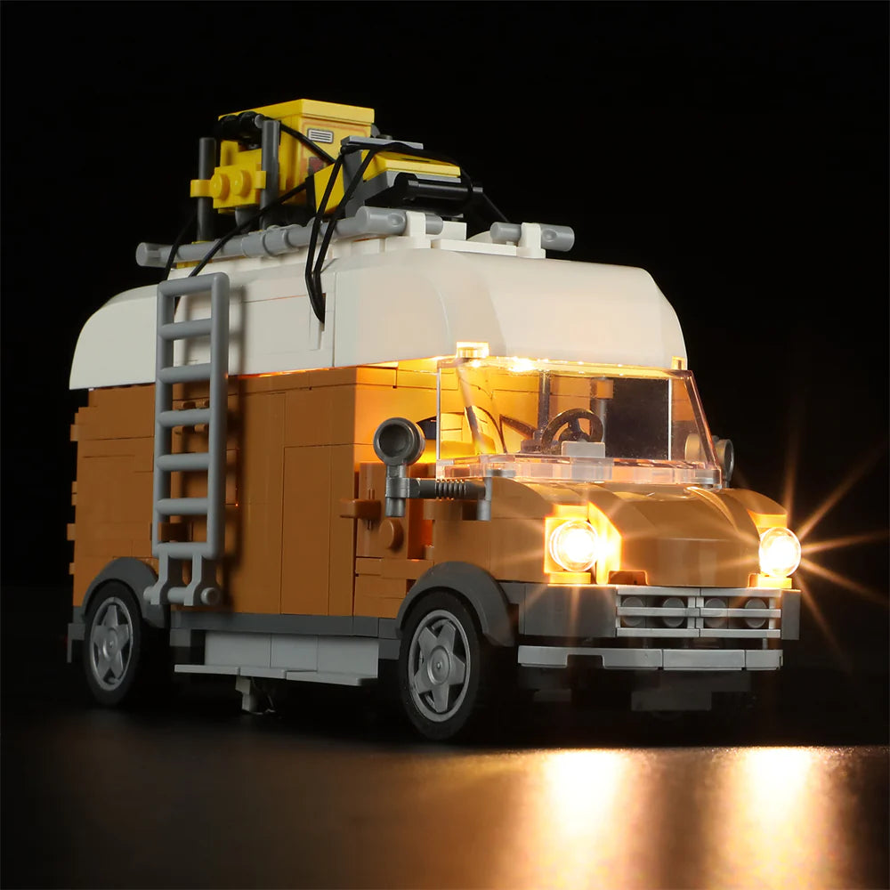Lumibricks F9030 Carpentry Van front angle at night with bright headlights, rooftop tools, and detailed van design