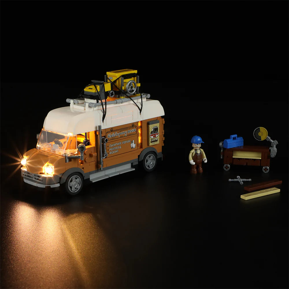 Lumibricks F9030 Carpentry Van at night with illuminated headlights and interior, carpenter minifigure, and woodworking tools