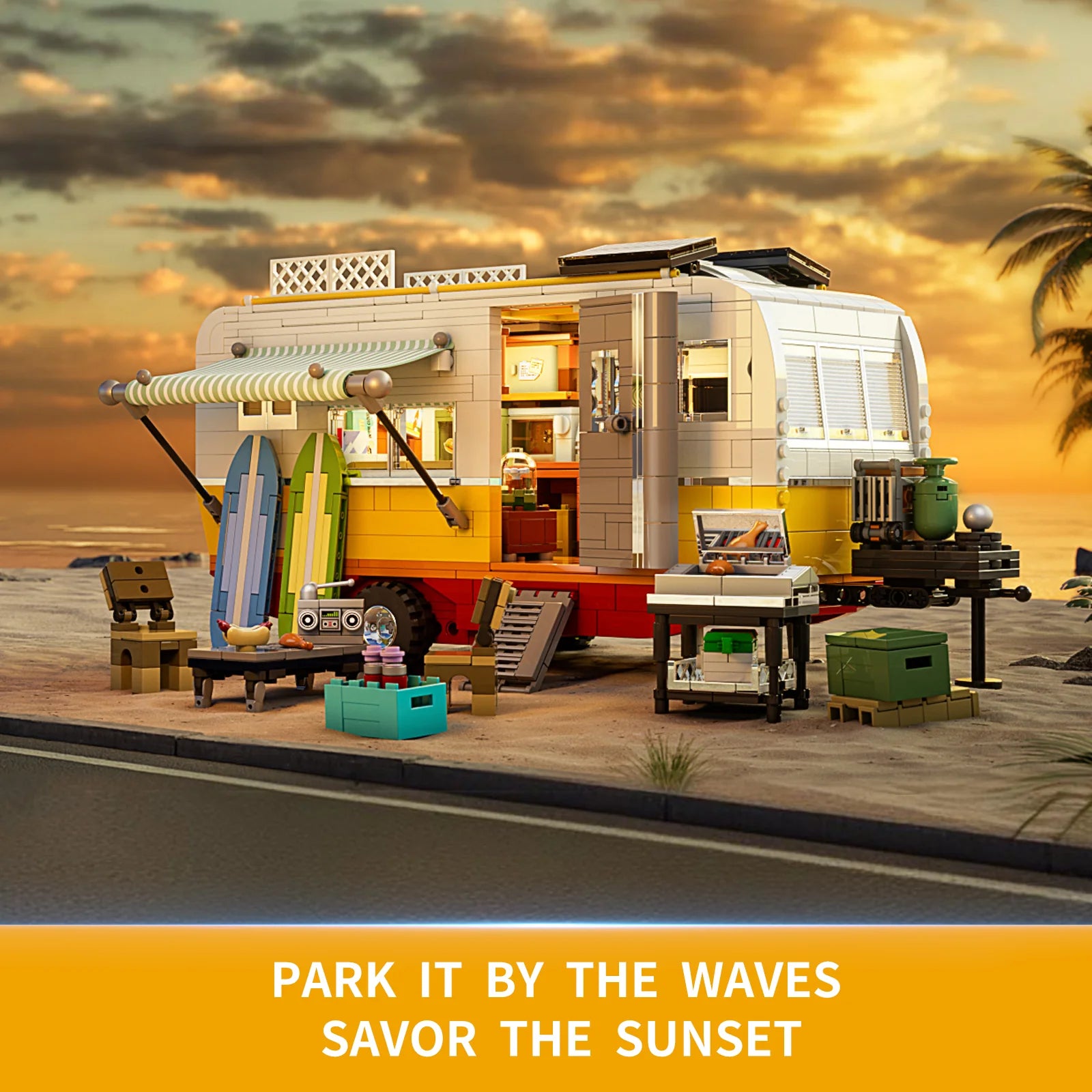 Lumibricks F9032 Travel Trailer parked by the beach at sunset, with surfboards, grill, and camping accessories