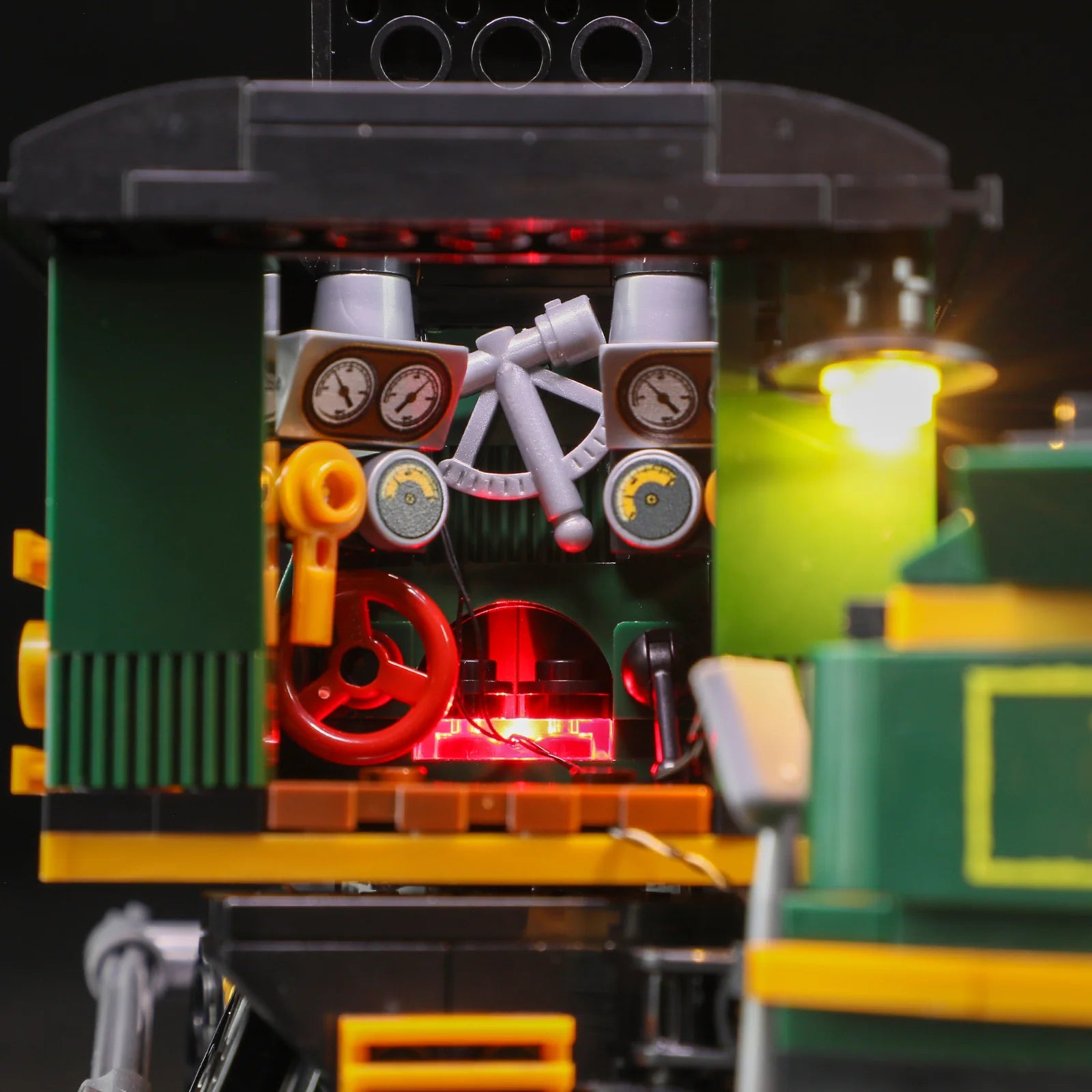 Lumibricks (Formerly Funwhole) F9036 Western Freight Train locomotive cab interior with illuminated gauges, levers, and red lighting