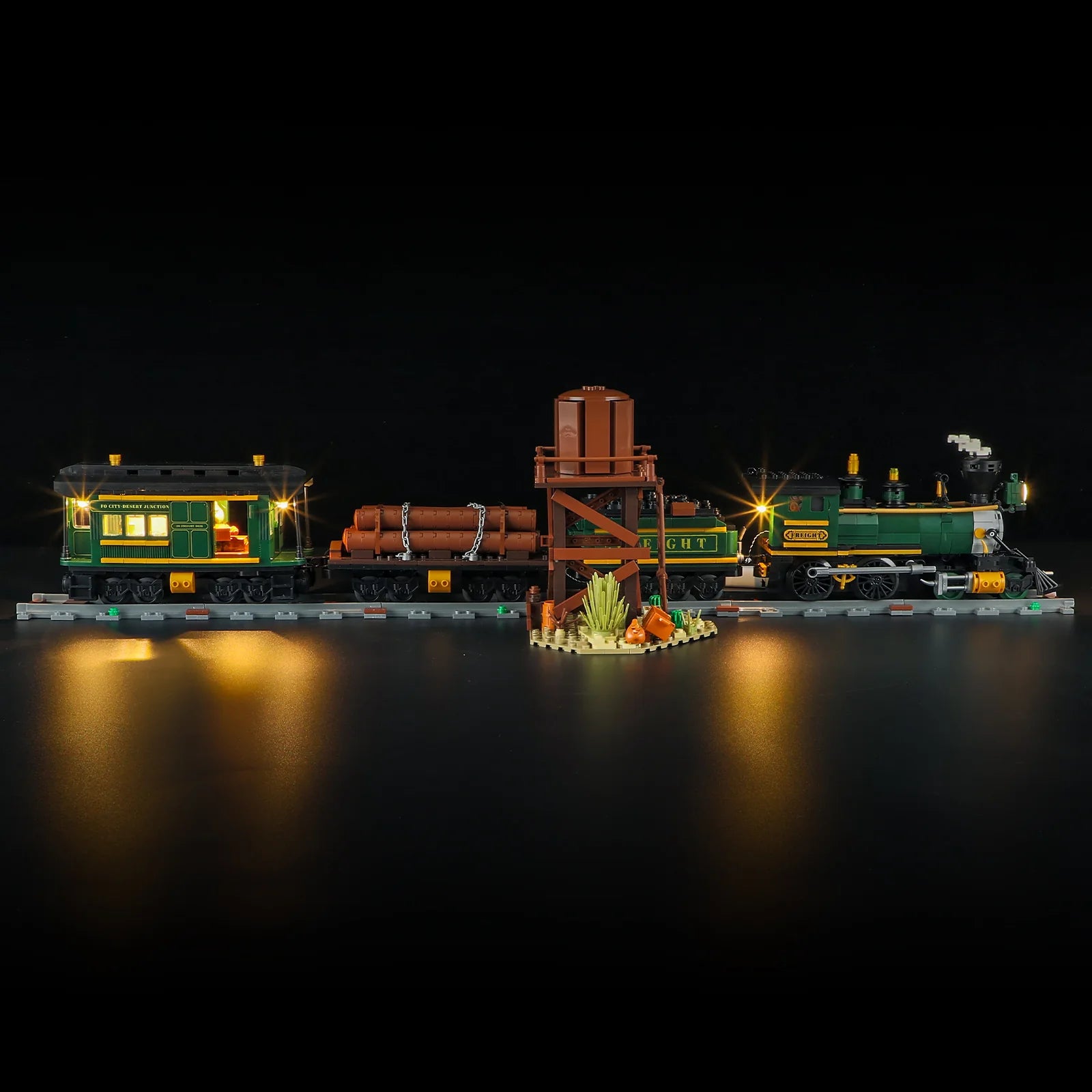 Lumibricks (Formerly Funwhole) F9036 Western Freight Train side view at night with illuminated cars, water tower, and Western details