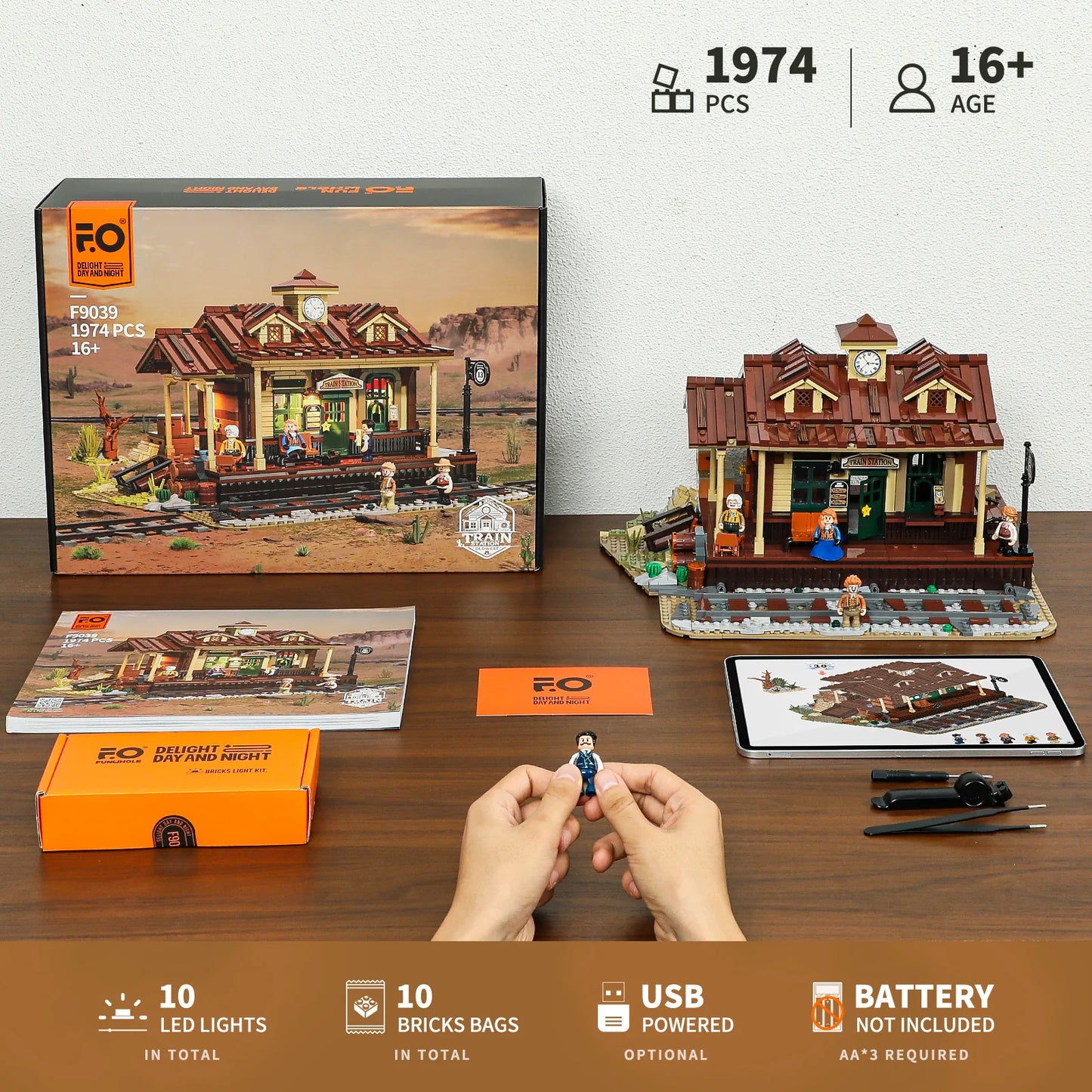 Lumibricks (formerly Funwhole) F9039 Western Train Station building set with box, manual, minifigures, and accessories shown.
