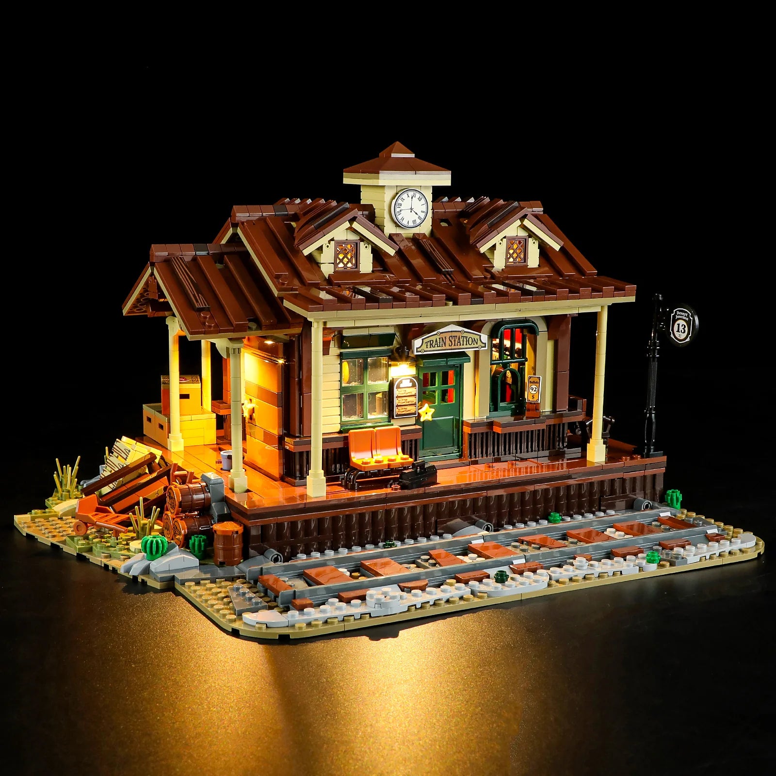 Lumibricks (formerly Funwhole) F9039 Western Train Station front view at night with warm lighting and detailed platform scene.