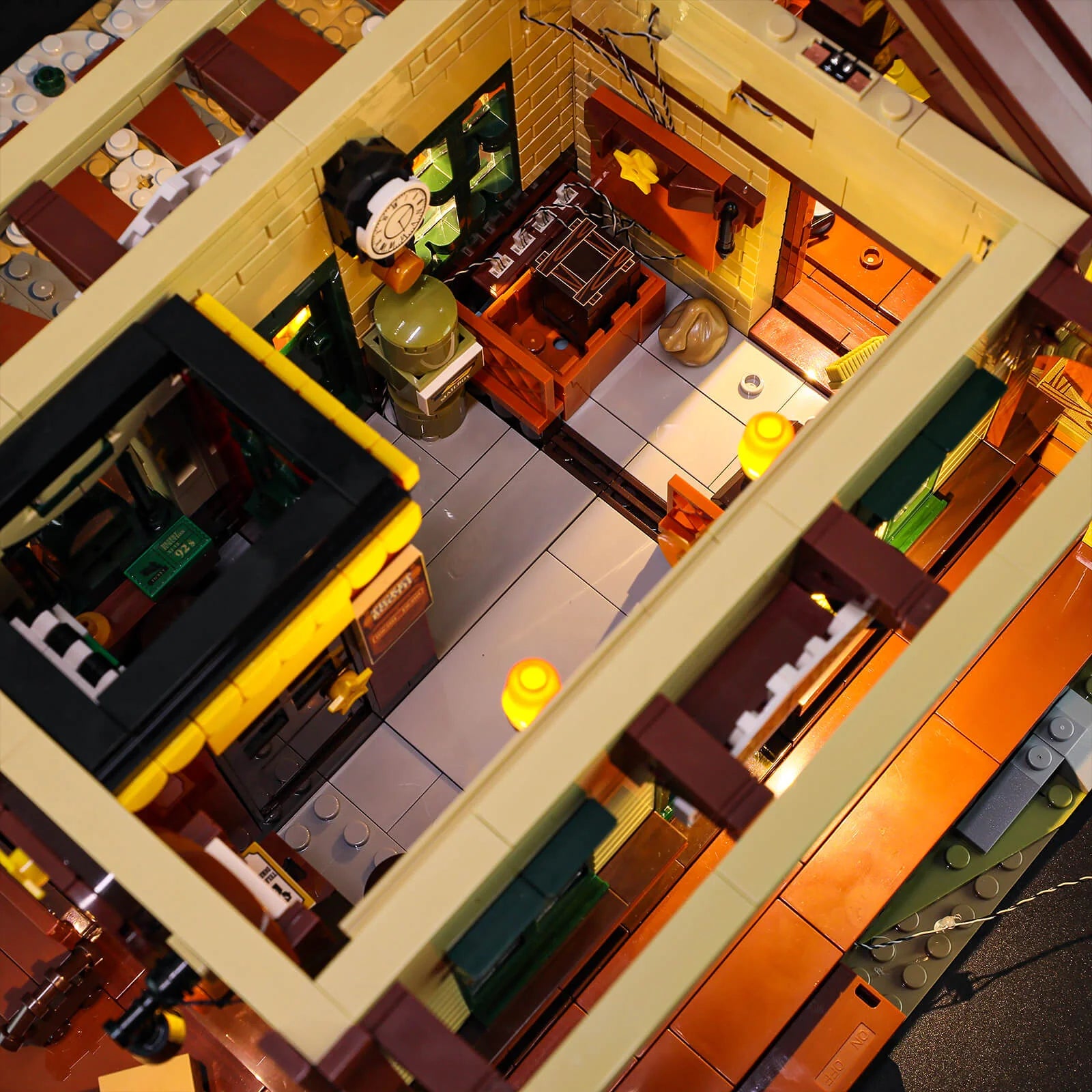 Lumibricks (formerly Funwhole) F9039 Western Train Station interior with illuminated ticket office, clock, and western details.