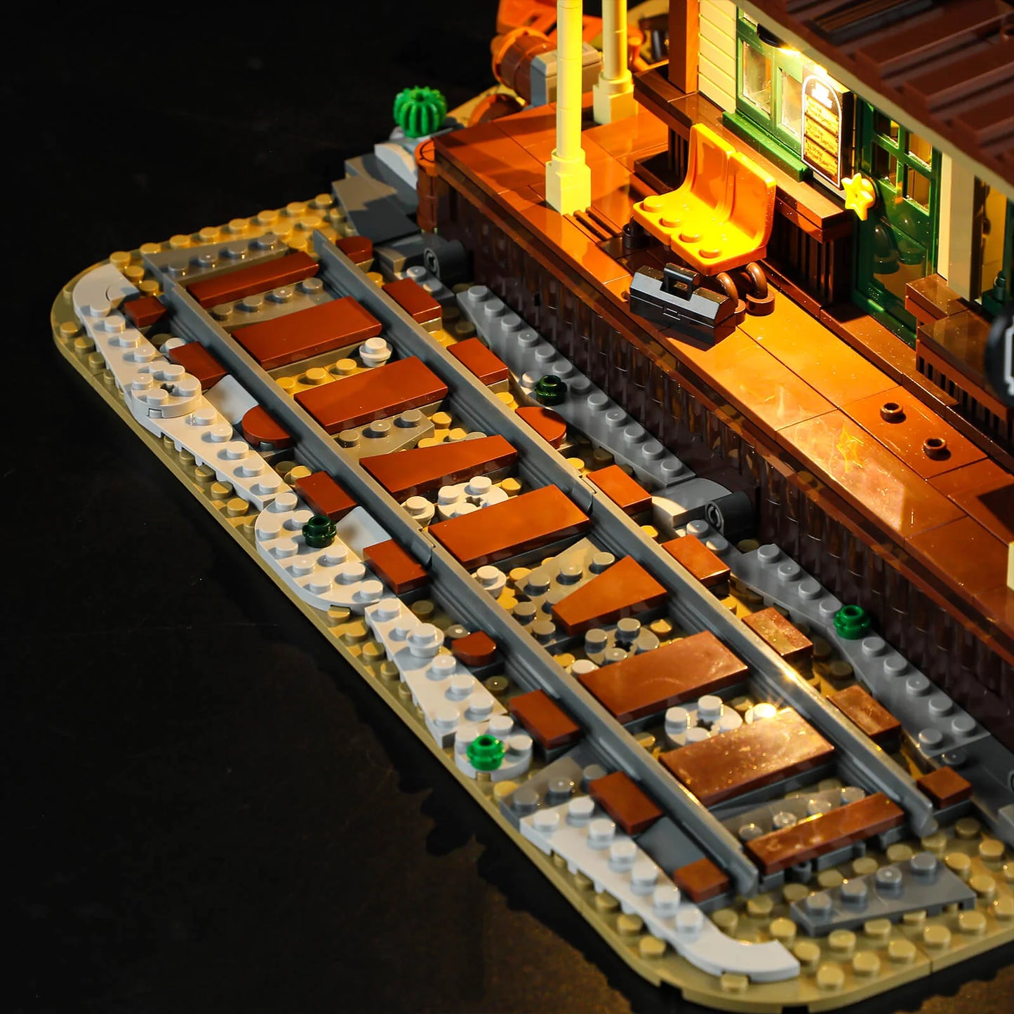 Lumibricks (formerly Funwhole) F9039 Western Train Station railway track and platform with realistic lighting and bench detail.