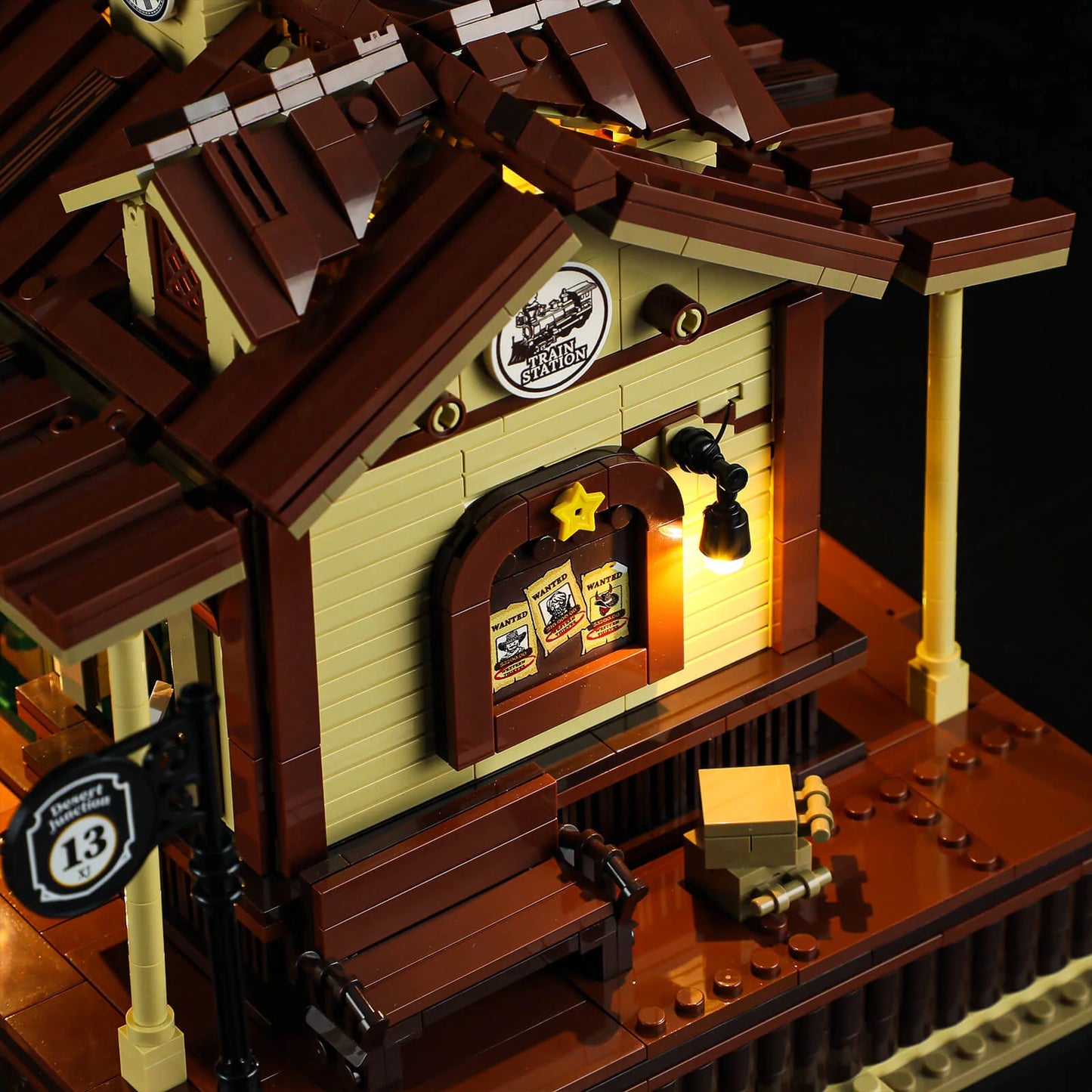 Lumibricks (formerly Funwhole) F9039 Western Train Station exterior with wanted posters, bench, and illuminated station sign.