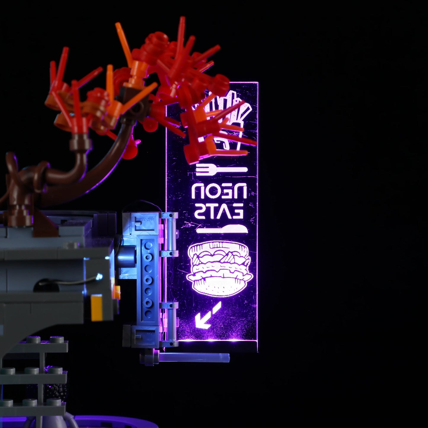 Lumibricks (Formerly Funwhole) F9042 Cyberpunk Apartment close-up of purple “Neon Eats” LED sign with burger graphic and tree detail