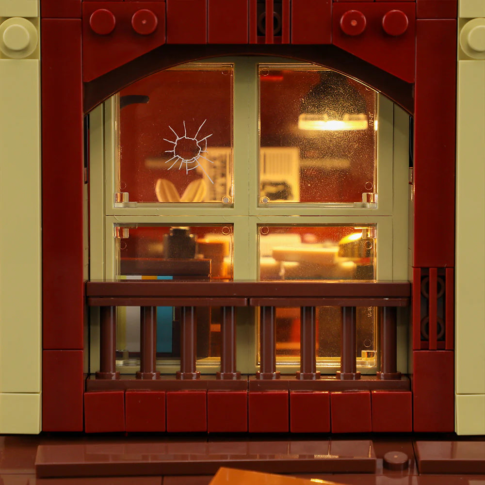 Lumibricks (Formerly Funwhole) F9044 Old West Post Office close-up of window with bullet hole and warm interior lighting