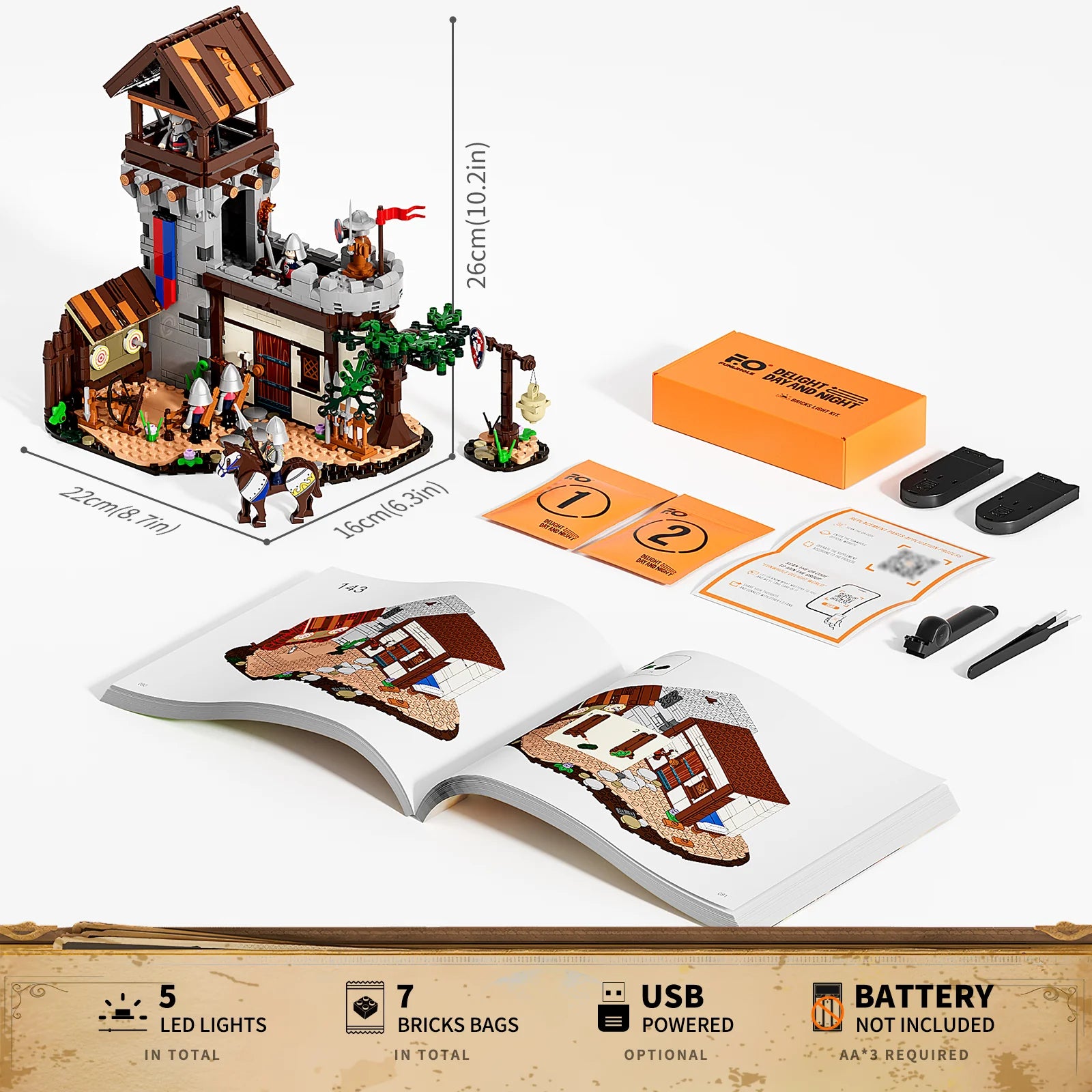 Lumibricks F9048 Training Ground package contents with assembled medieval training ground, 7 brick bags, 5 LED lights, instructions, USB light kit, battery holders, and set dimensions (26 x 22 x 16 cm)