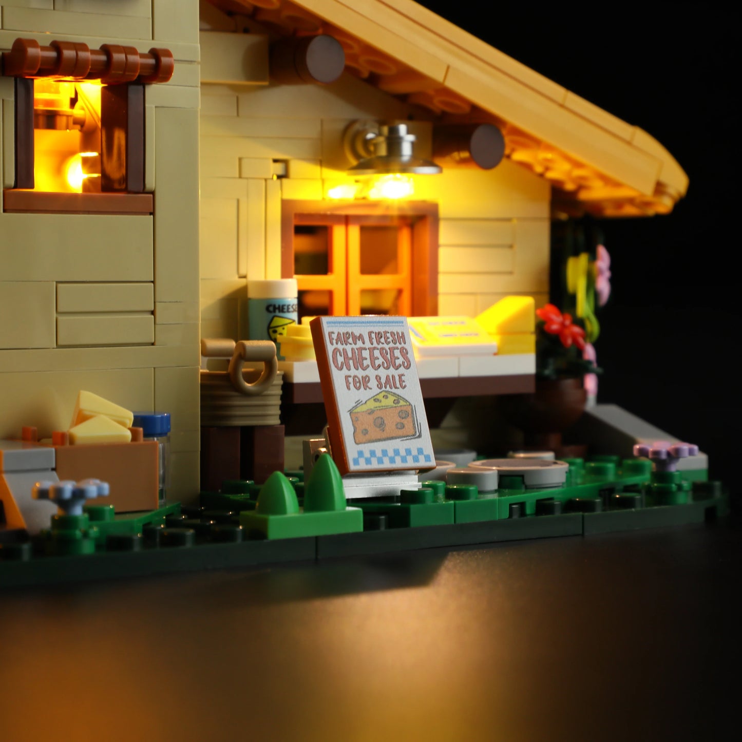 Lumibricks (Formerly Funwhole) F9049 Farm Cheese House front with “Farm Fresh Cheeses for Sale” sign and glowing windows