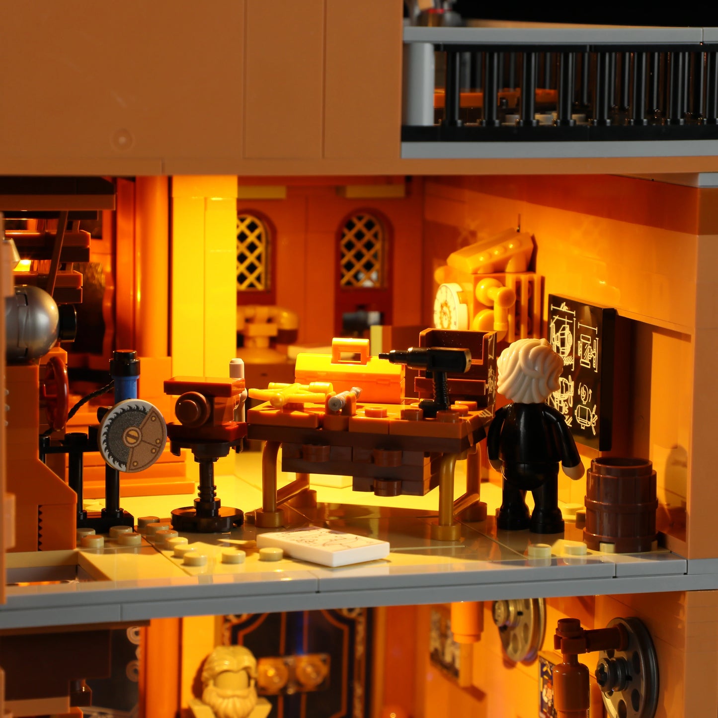Lumibricks F9050 Steampunk Flying Club inventor’s workshop with glowing lights, workbench, chalkboard, and minifigure at desk