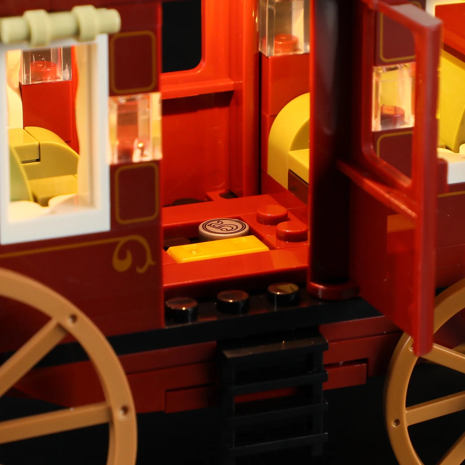 Lumibricks (Formerly Funwhole) F9052 Western Stagecoach interior with illuminated seats, gold bar, and hidden mail compartment