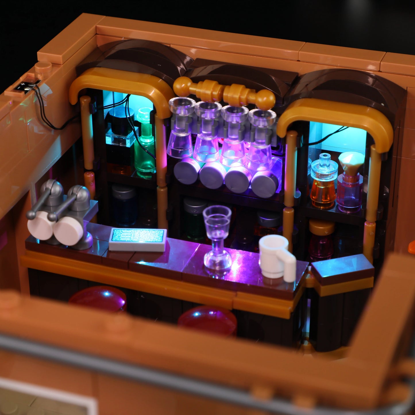 Lumibricks (Formerly Funwhole) F9054 Twilight Motel illuminated bar interior with colorful bottles, glasses, and vintage counter