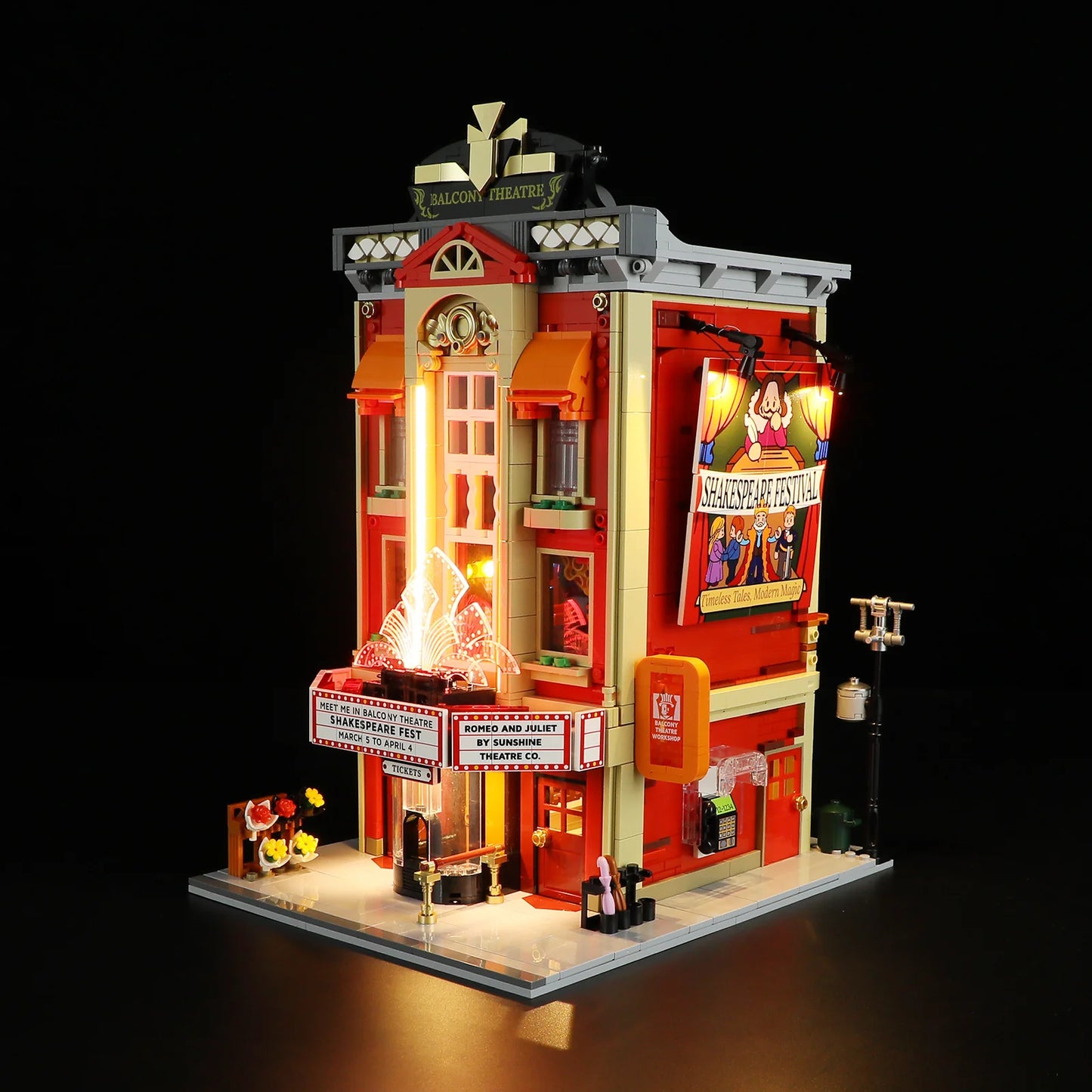 Lumibricks (Formerly Funwhole) F9056 Balcony Theatre at night with LED lights, illuminated marquee, and detailed modular exterior