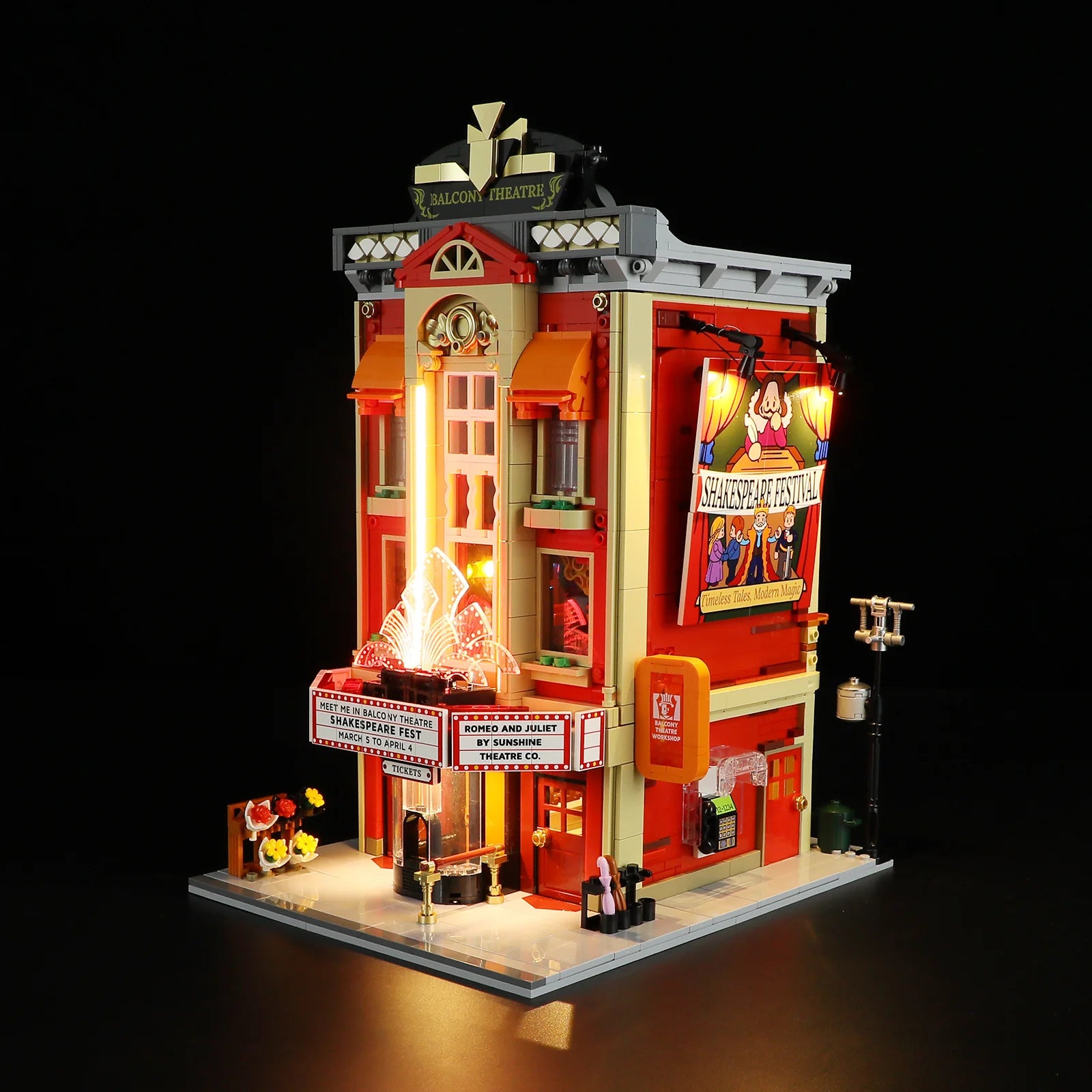 Lumibricks (Formerly Funwhole) F9056 Balcony Theatre at night with LED lights, illuminated marquee, and detailed modular exterior