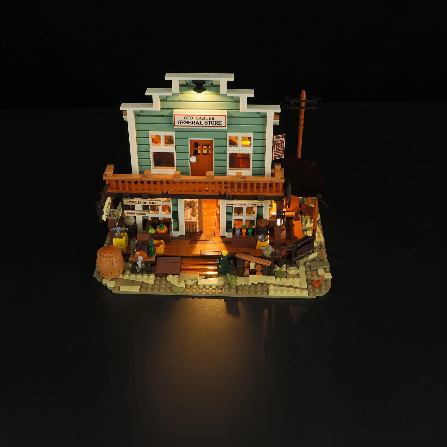 Lumibricks (Formerly Funwhole) F9057 General Store modular building with LED lights, Western facade, and detailed storefront at night