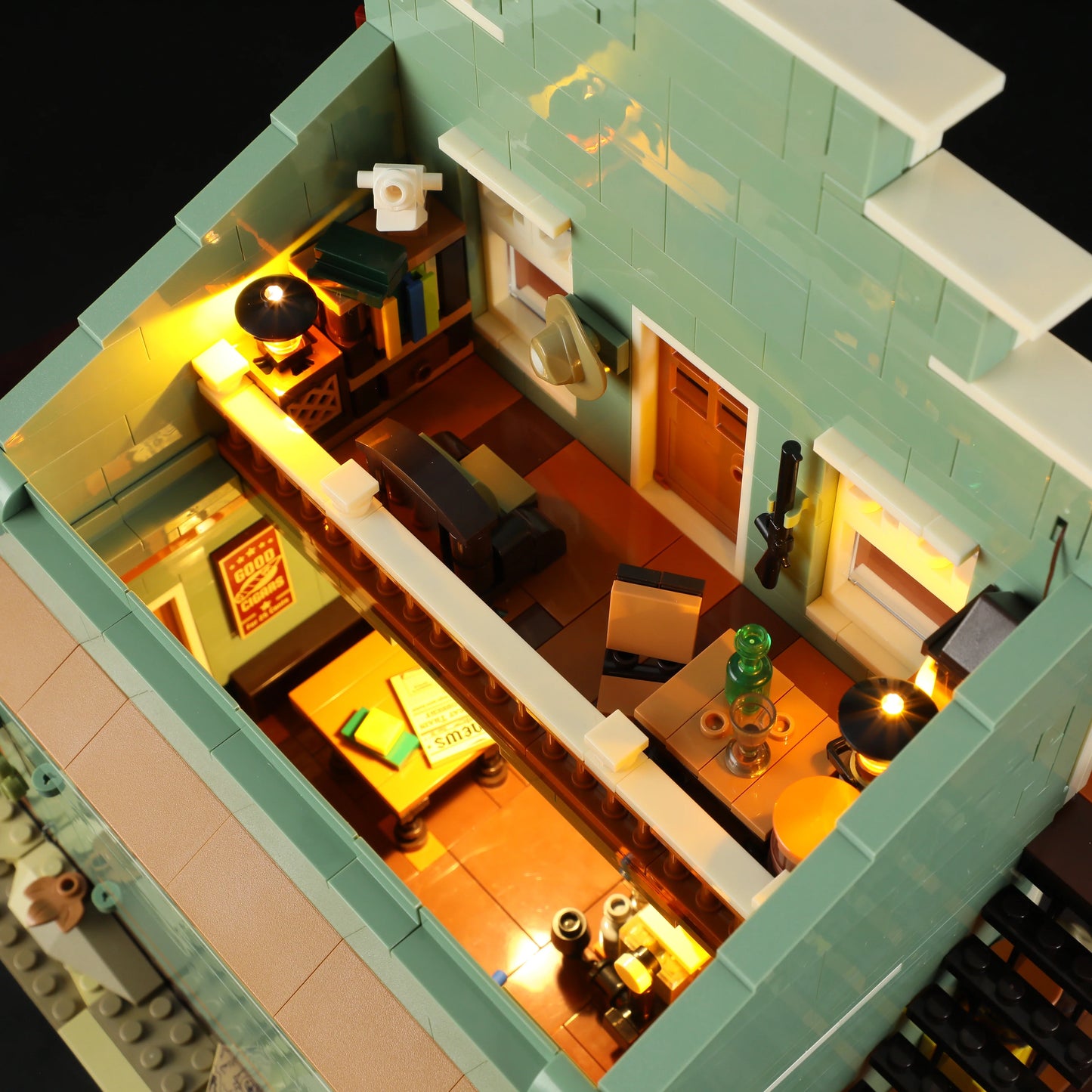 Lumibricks (Formerly Funwhole) F9057 General Store upstairs interior with illuminated desk, bookshelf, and Western furnishings