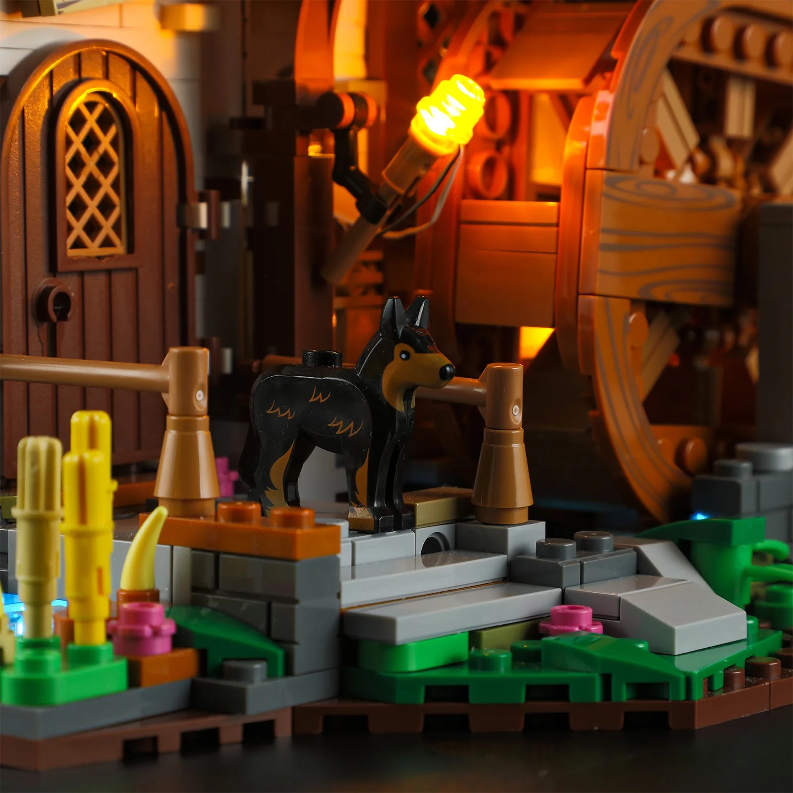 Lumibricks (Formerly Funwhole) F9061 Medieval Water Mill exterior with black dog, glowing lantern, and detailed waterwheel at night