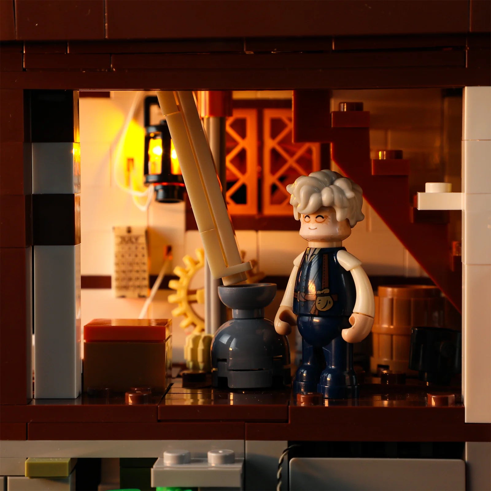 Lumibricks (Formerly Funwhole) F9061 Medieval Water Mill interior with minifigure, grain chute, gears, and warm LED lighting